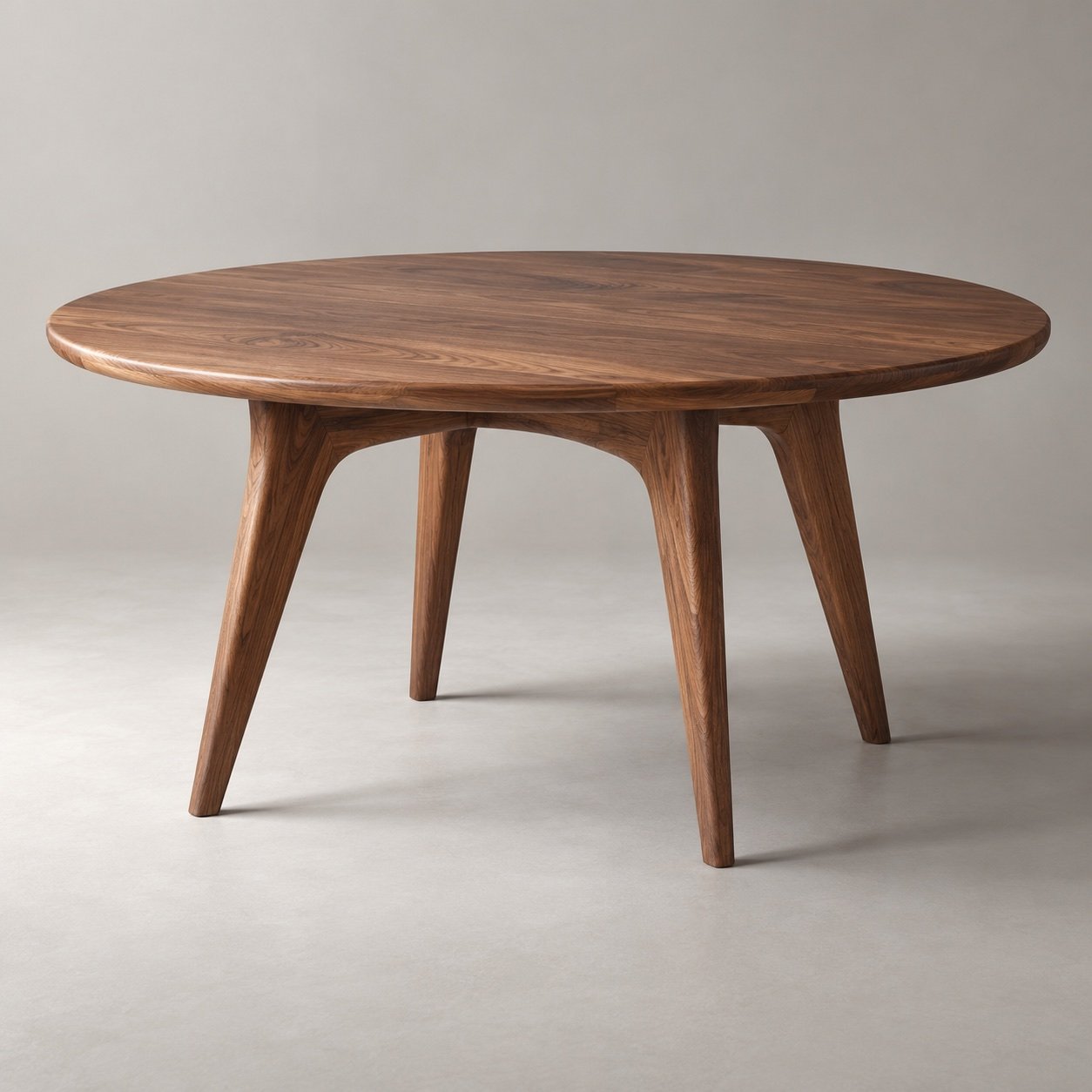 A round walnut dining table